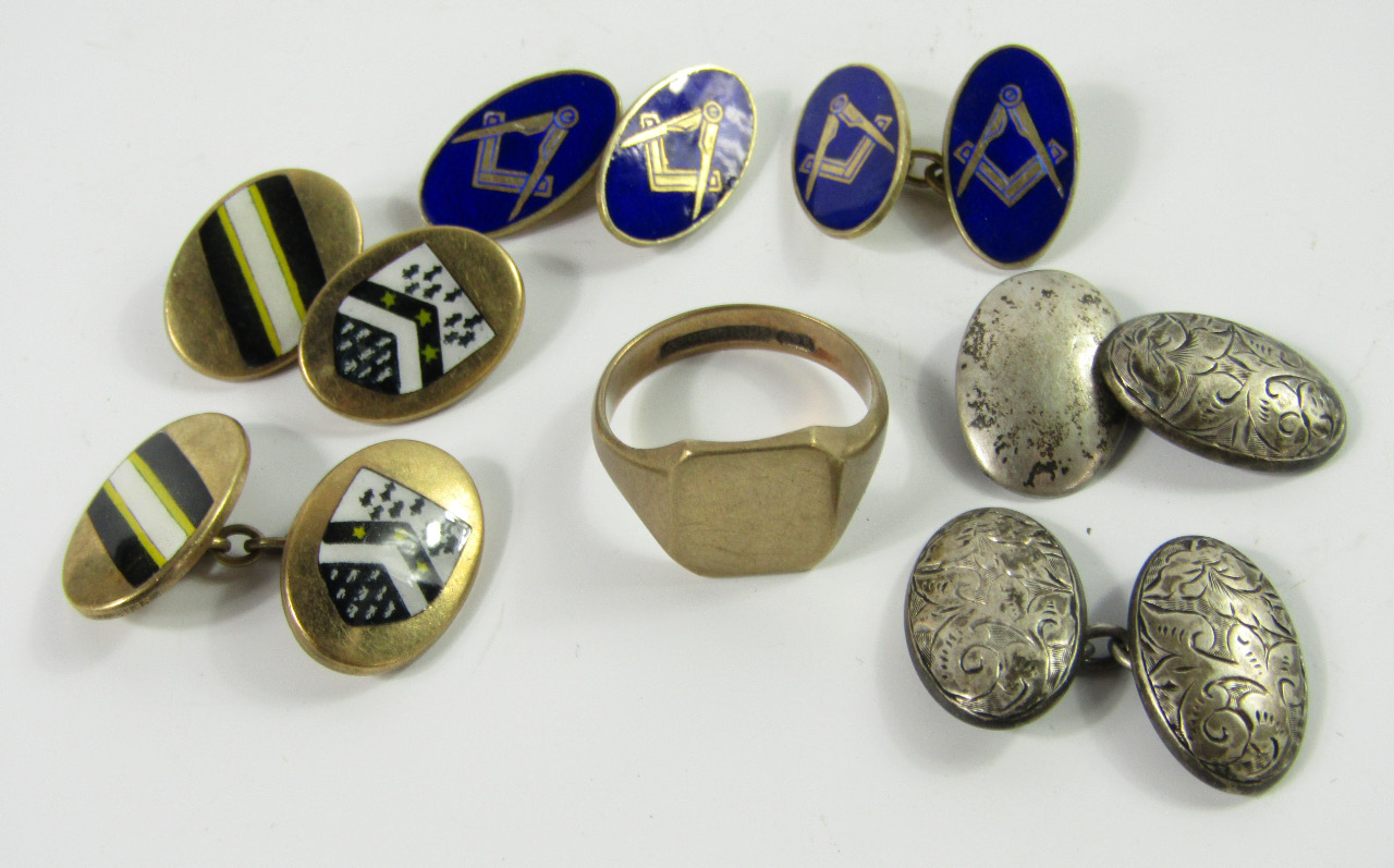 Appraisal: A pair of blue enamelled Masonic cufflinks a pair of