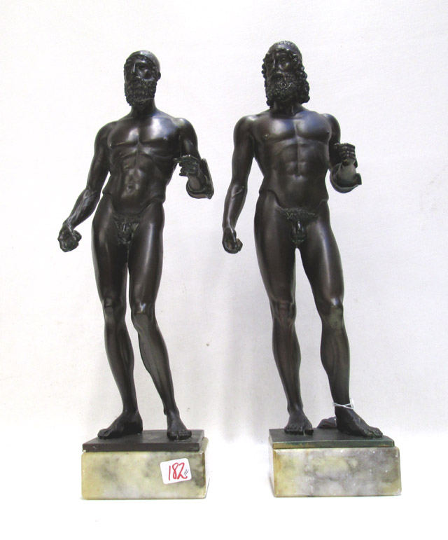 Appraisal: PAIR OF BRONZE STYLE FIGURAL SCULPTURES resin nude male figures