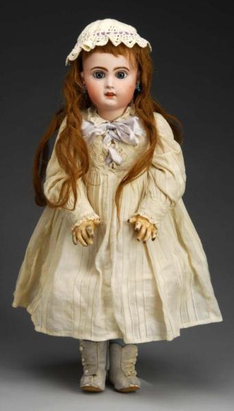 Appraisal: Tete Jumeau Bebe Doll Description French Ca Bisque socket head