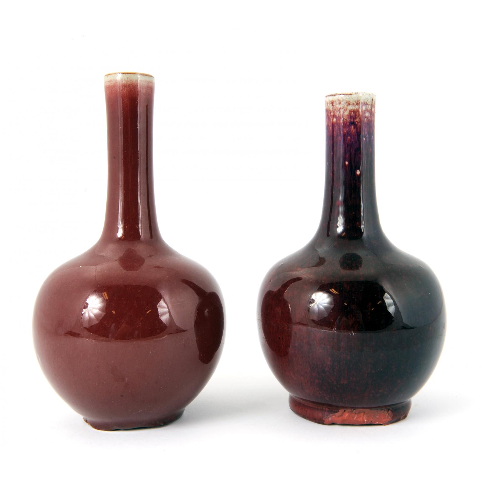 Appraisal: Two Chinese Red Long Necked Vases two Chinese red glazed