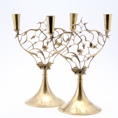 Appraisal: HAGENAUER Pair of polished bronze double candelabra with elaborate bird