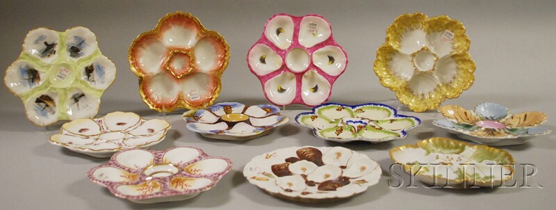 Appraisal: Eleven Assorted Mostly Limoges Gilt and Hand-painted Porcelain Oyster Plates