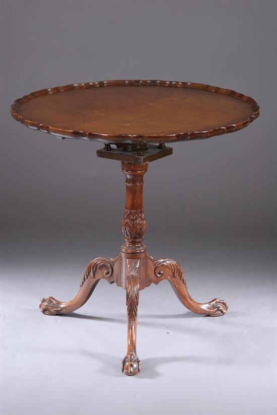 Appraisal: ENGLISH GEORGE II-STYLE CARVED MAHOGANY TILT-TOP TABLE th century Raised