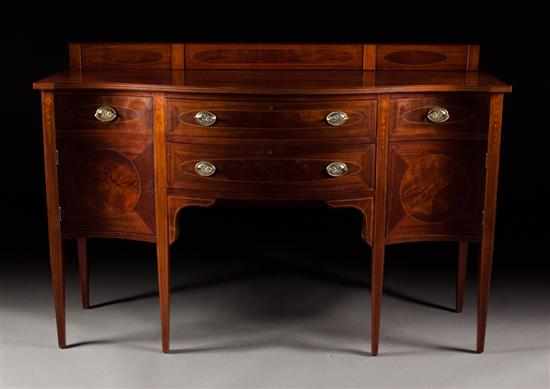 Appraisal: Federal style inlaid mahogany serpentine sideboard with stringer bellflower and