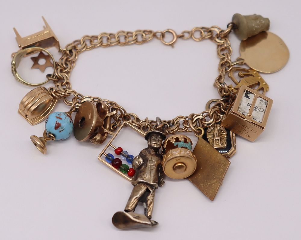 Appraisal: JEWELRY kt Gold Charm Bracelet and Charms Includes a kt