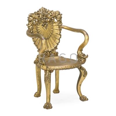 Appraisal: GROTTO STYLE GILT WOOD ARMCHAIR Shell carved backrest early th