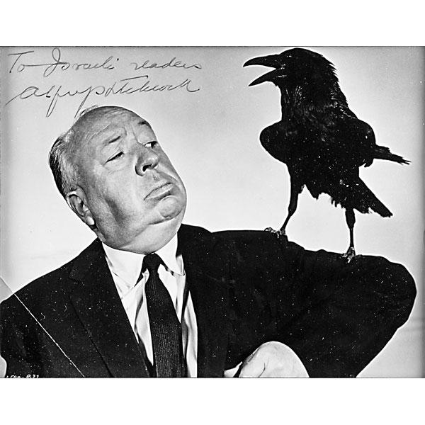 Appraisal: ALFRED HITCHCOCK AUTOGRAPH On black and white photograph Framed Image