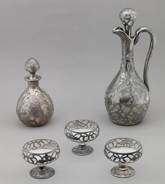 Appraisal: A group of silver overlaid clear glass articles Comprising stoppered