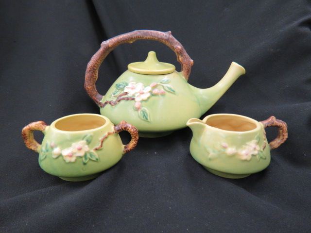 Appraisal: Roseville Pottery Apple Blossom Tea Set green excellent