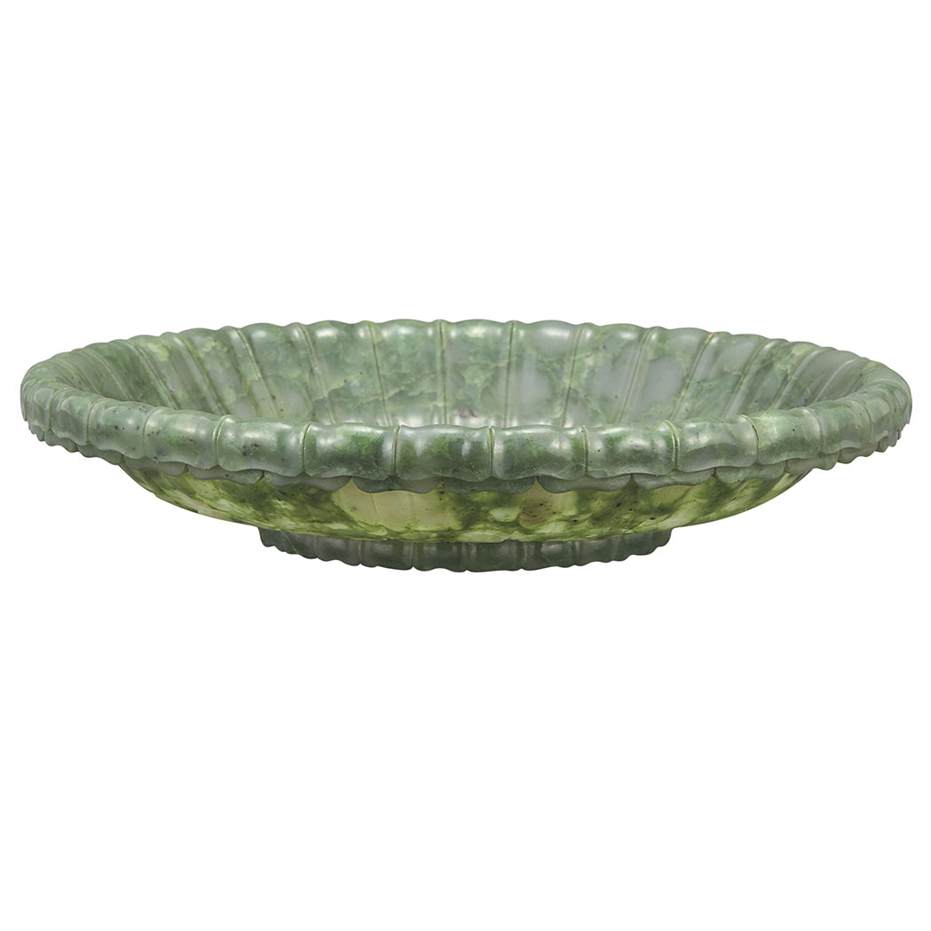 Appraisal: Chinese Spinach Green Jade Mughal Dish Qing Dynasty The flower-form