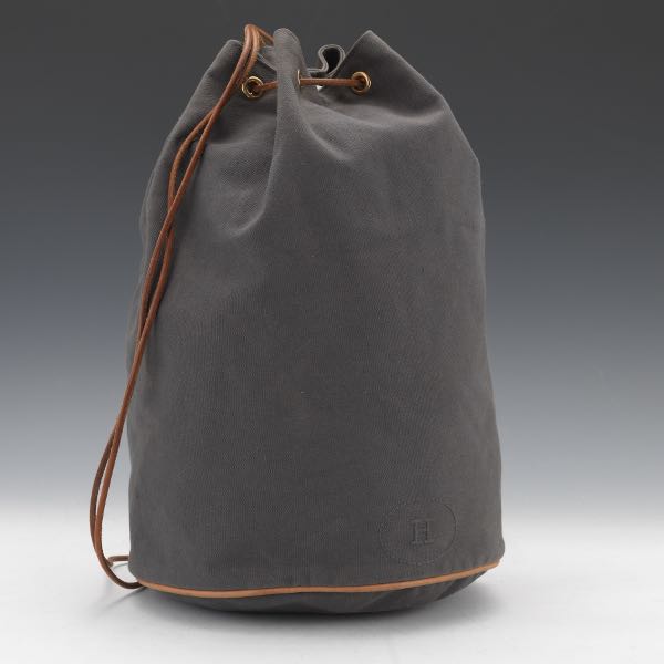 Appraisal: HERMES POLOCHON MIMILE DRAWSTRING SAC MM x Grey canvas brown