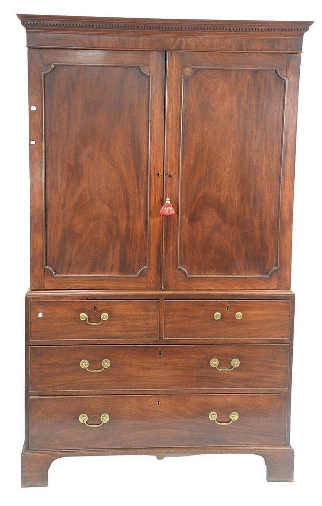 Appraisal: George III Mahogany Linen Press in three parts having pull-out