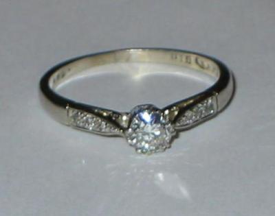 Appraisal: A SOLITAIRE DIAMOND RING the brilliant cut stone approximately cts