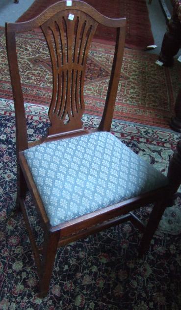 Appraisal: A set of four George III mahogany single dining chairs