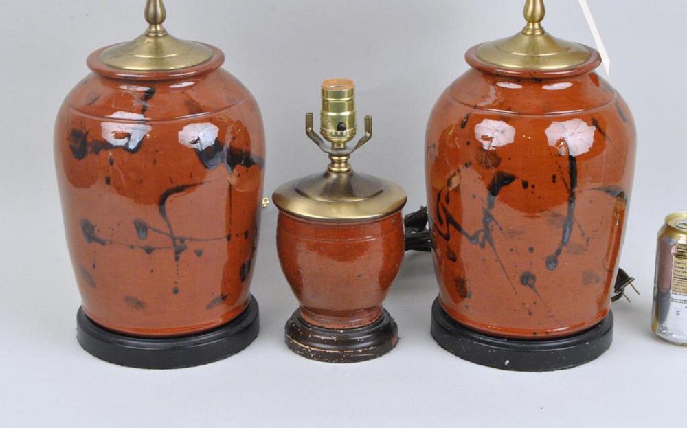 Appraisal: Group Three Pottery Vessels As Lamps comprising a pair of