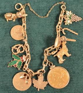 Appraisal: Vintage K Yellow Gold Charm Bracelet Set with various charms