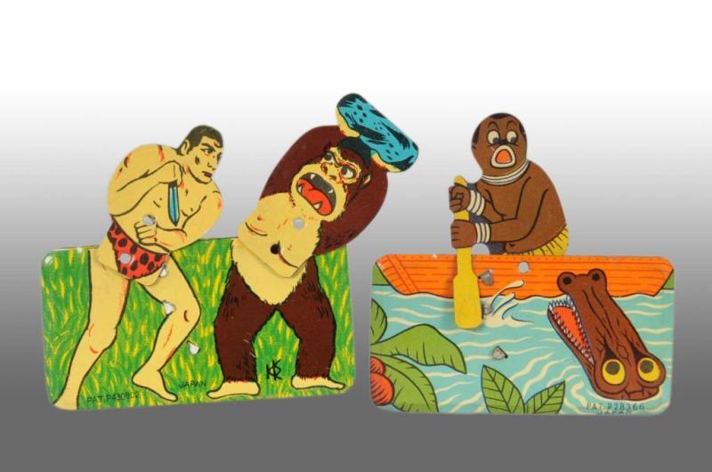 Appraisal: Lot of Tin Tarzan Africa Clicker Toys Description Japanese Includes