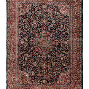 Appraisal: A Kirman Wool Rug Circa feet inches x feet inches