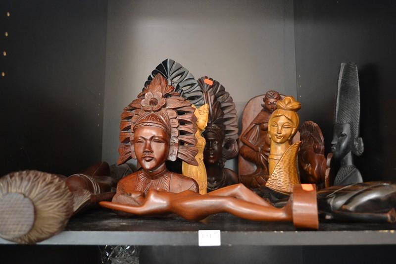 Appraisal: SHELF OF INDONESIAN CARVED WOODEN FIGURES