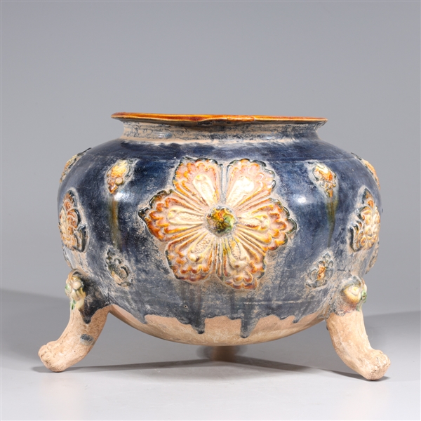 Appraisal: Chinese sancai glazed tripod vessel with molded floral designs to