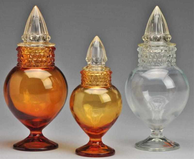 Appraisal: Lot of Heck Spired Urn Glass Apothecary Jars Description Heck