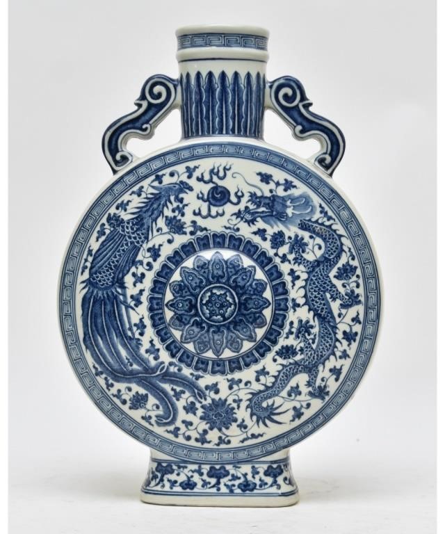 Appraisal: Blue and white Chinese porcelain moon flask decorated with dragons