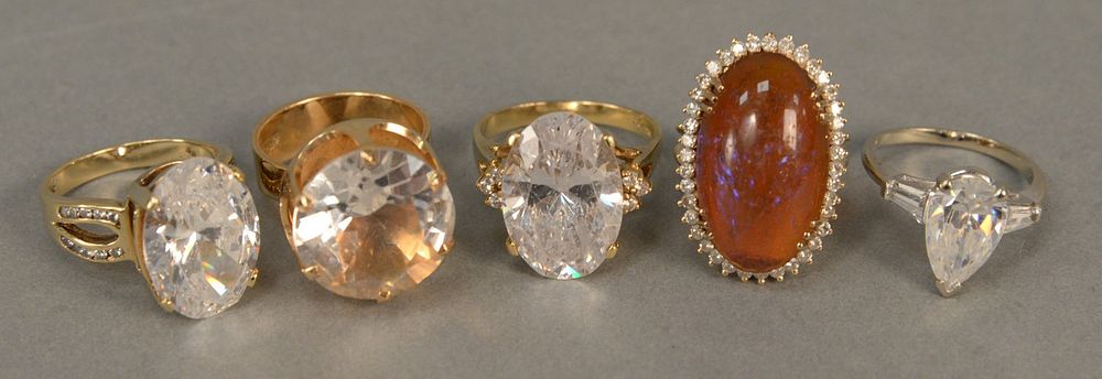 Appraisal: Five K gold rings with stones total weight grams Five