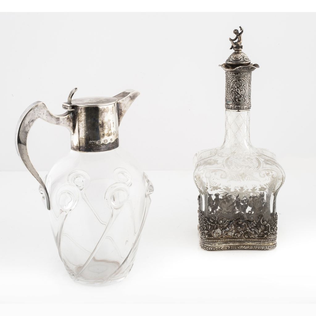 Appraisal: A silver mounted claret jug B Muller Son Chester the