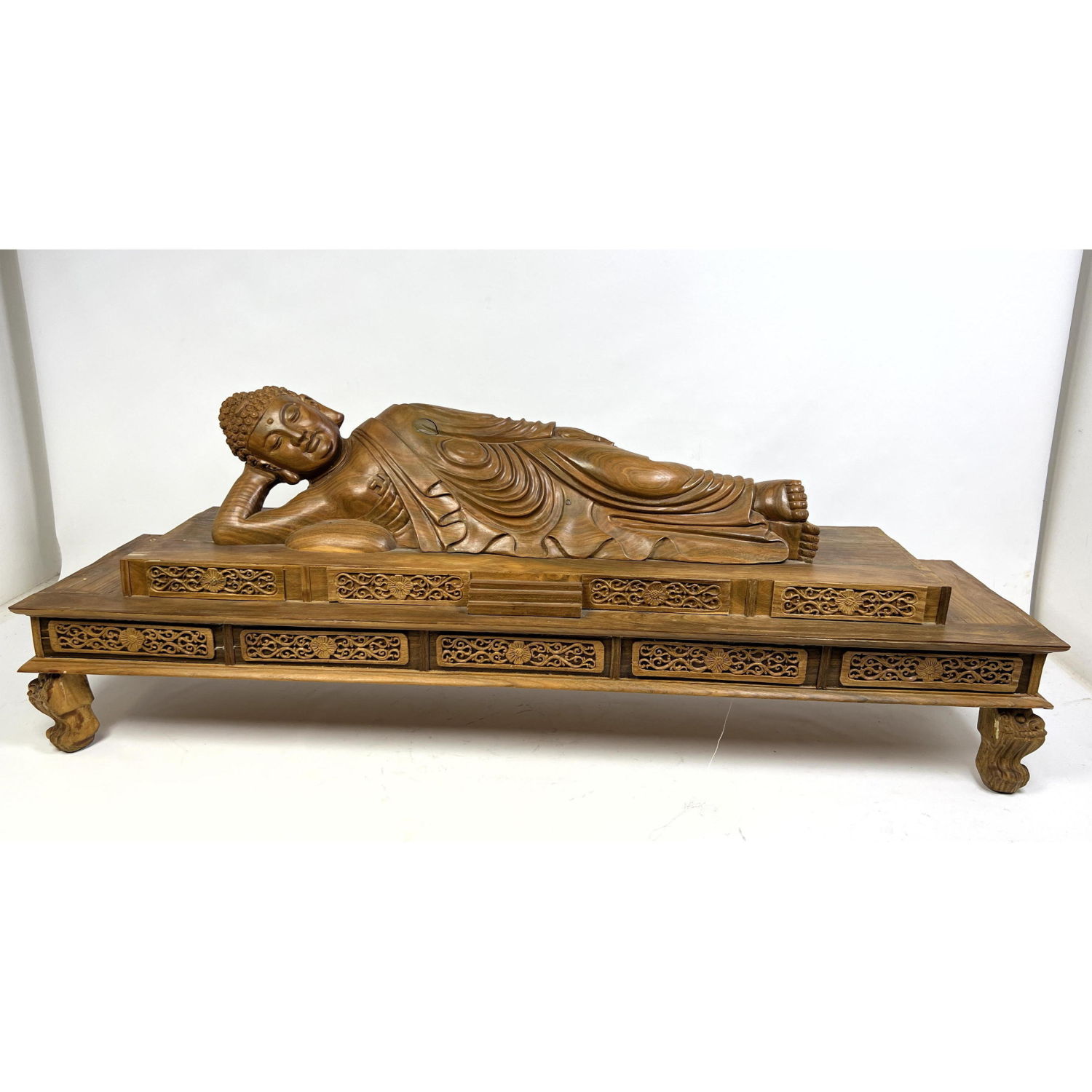 Appraisal: Asian Carved Wood Reclining Buddha Sculpture Figure reclines on double