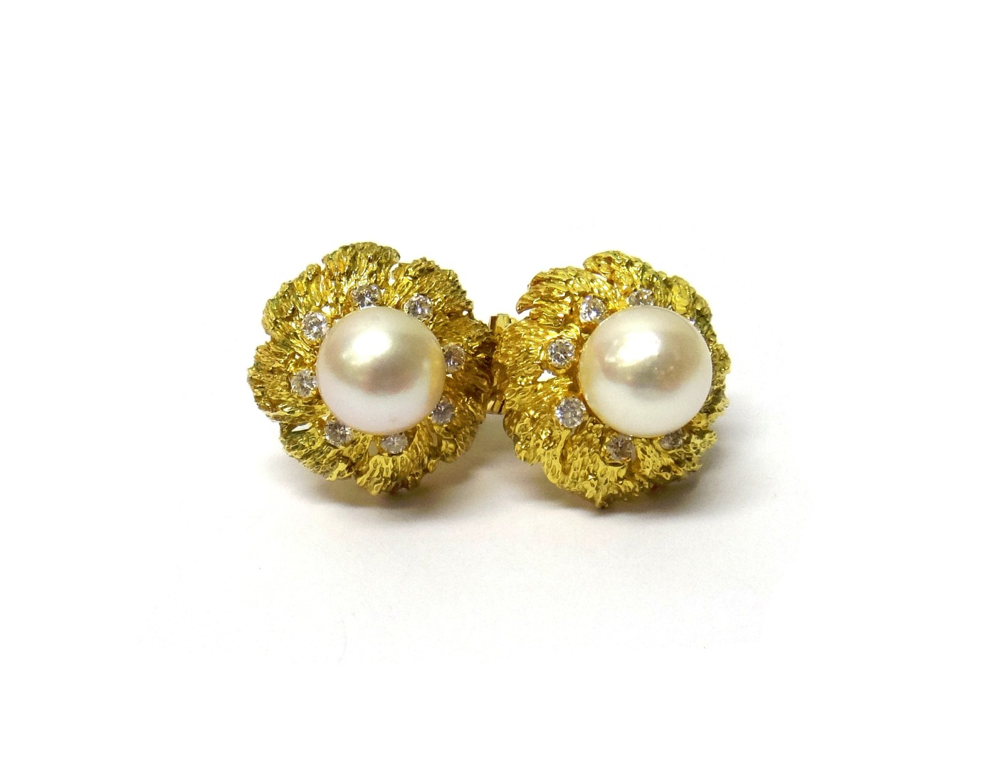 Appraisal: A pair of gold cultured pearl and diamond set earclips