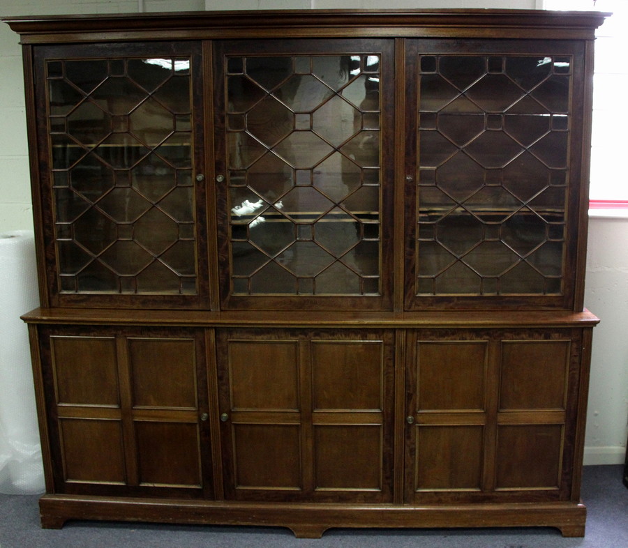 Appraisal: A mahogany bookcase the upper section with moulded cornice above