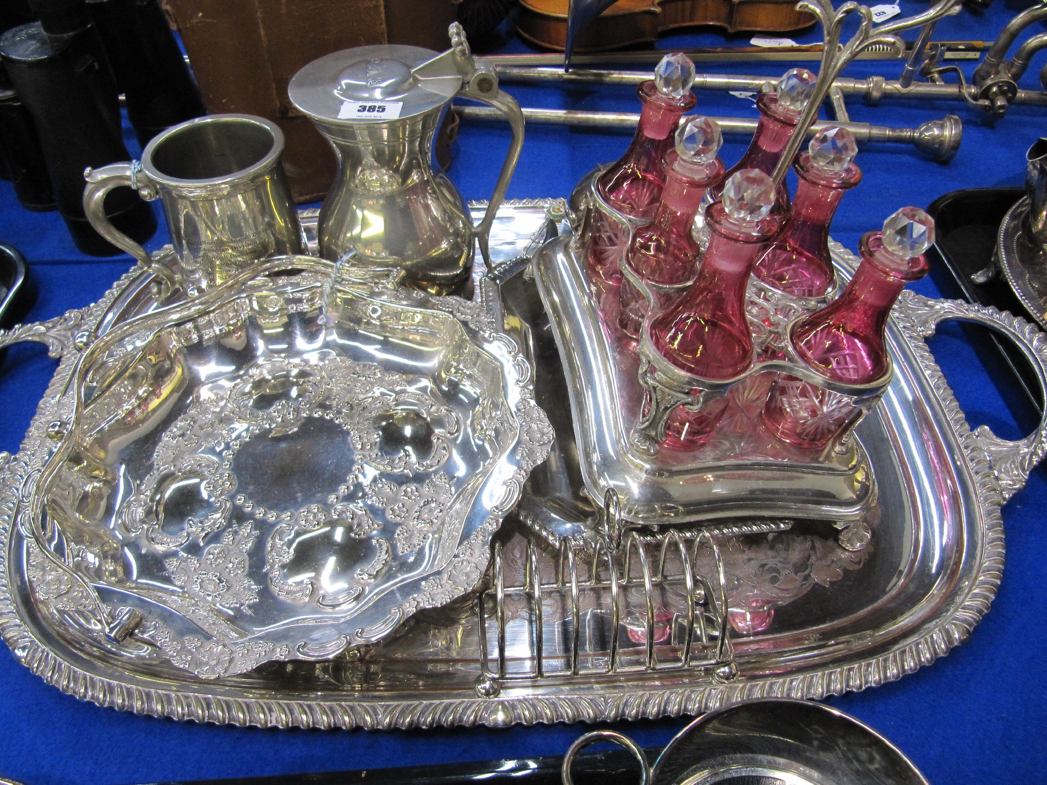 Appraisal: A lot comprising cruet set tankards basket and serving tray