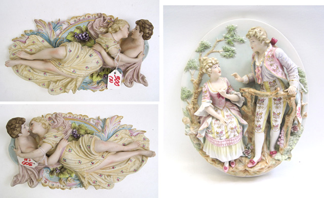 Appraisal: THREE ITALIAN BISQUE OVOID WALL PLAQUES a pair depicting lovers