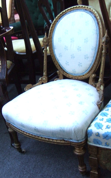 Appraisal: A Louis XVI style giltwood nursing chair oval back and