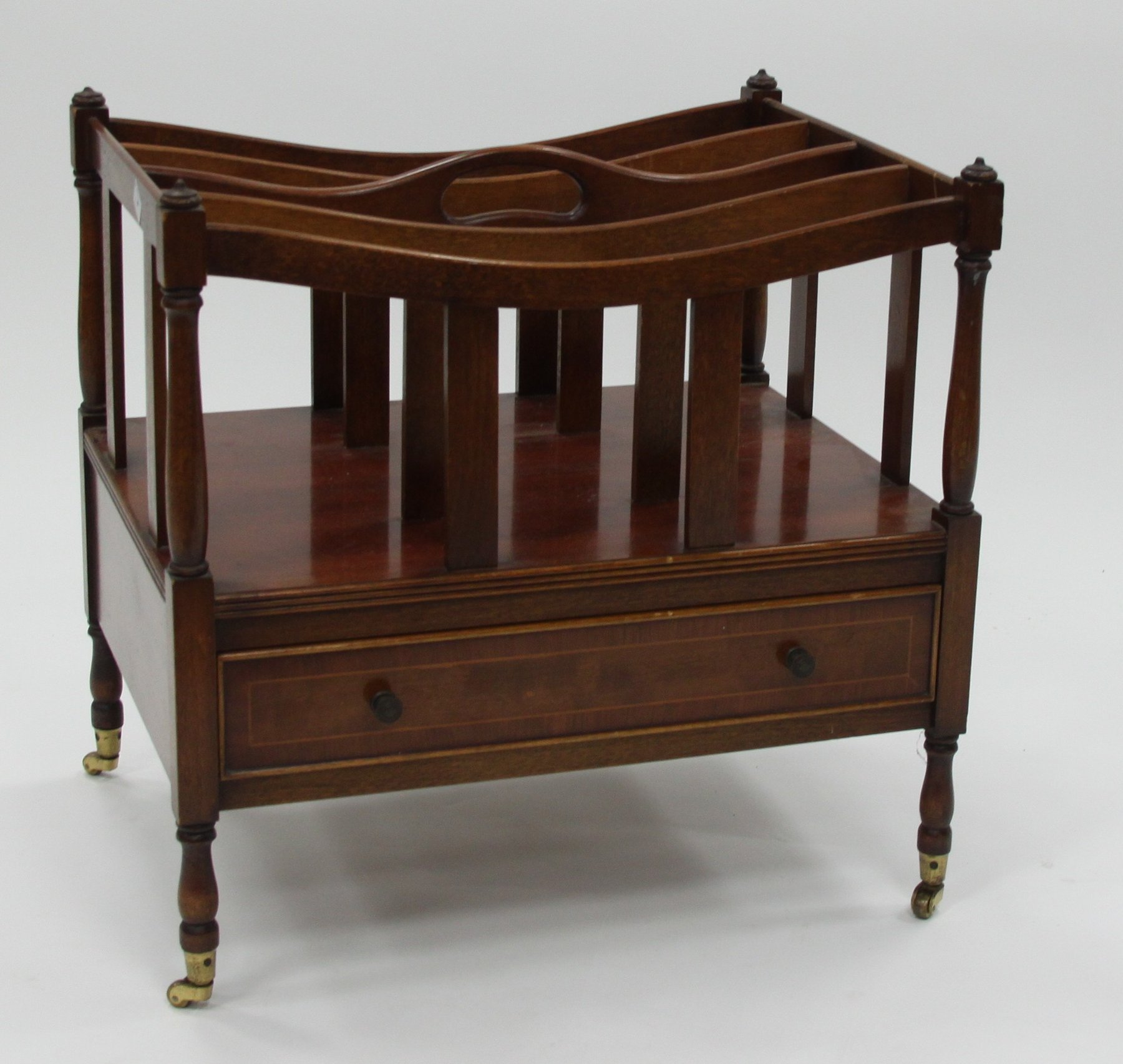 Appraisal: A mahogany-five division Canterbury fitted a drawer on turned legs