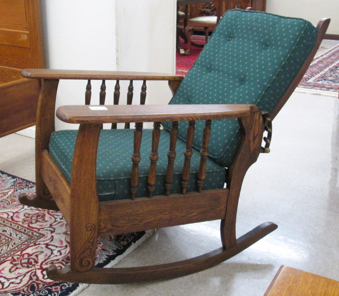 Appraisal: AN OAK 'MORRIS' ARMCHAIR ROCKER American c having an adjustable