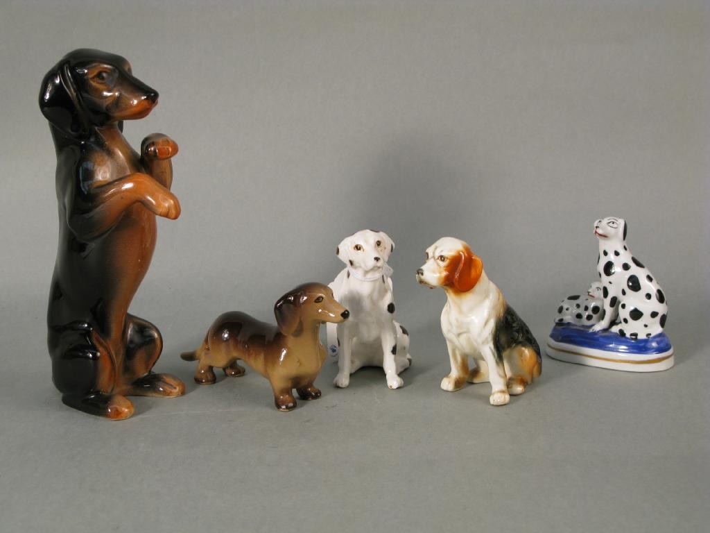 Appraisal: Two bone china dog models in a Sylvac dog in