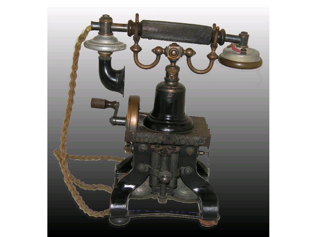 Appraisal: Early skeleton telephone comprising a bakelite handled receiver over an