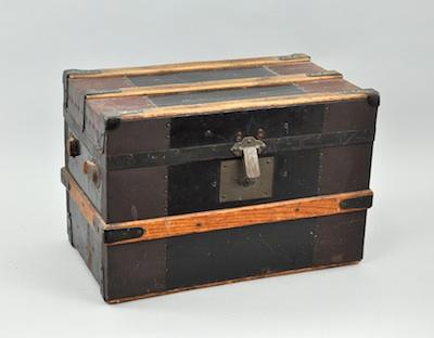 Appraisal: A Vintage Miniature Trunk The doll size trunk approx W