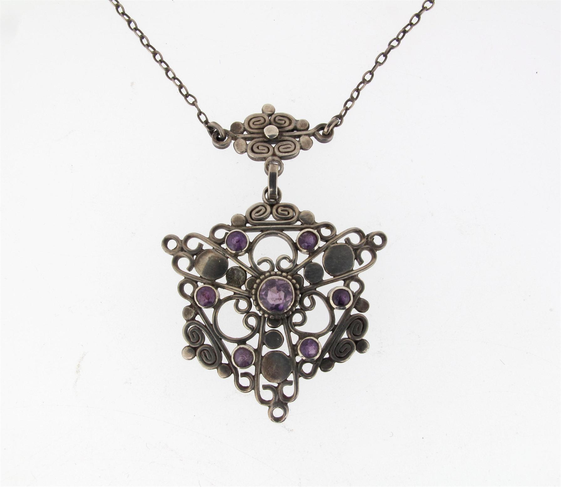 Appraisal: An amethyst Arts and Crafts silver pendant