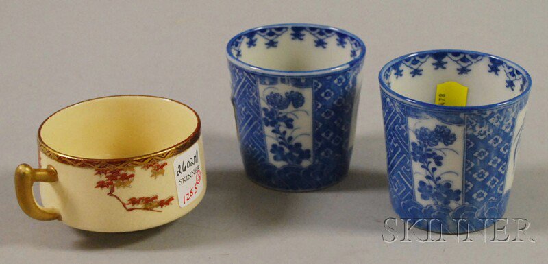 Appraisal: Pair of Japanese Blue and White Transfer-decorated Porcelain Cups and