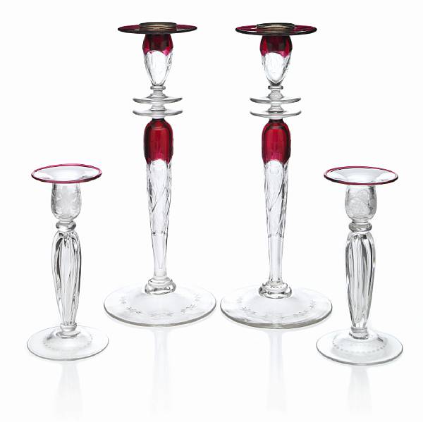 Appraisal: A pair of Steuben Gold Ruby over clear glass candlesticks