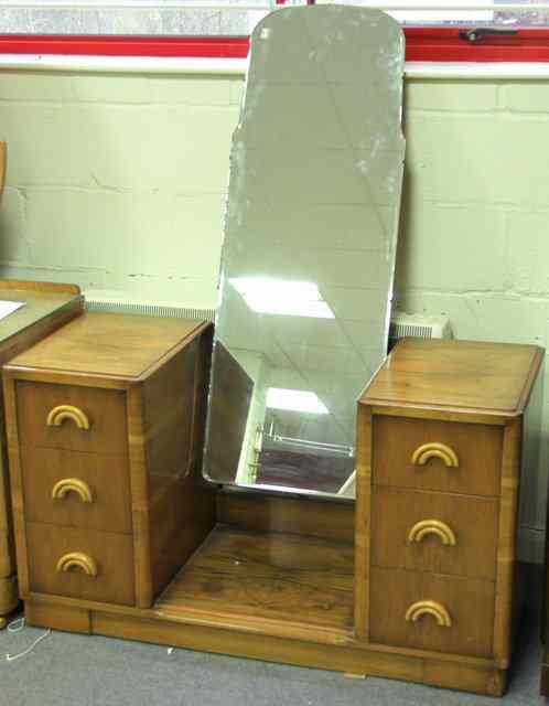 Appraisal: An Art Deco style dressing table with mirror and pedestal