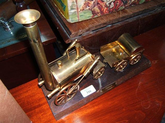 Appraisal: A brass model of Stephenson's Rocket