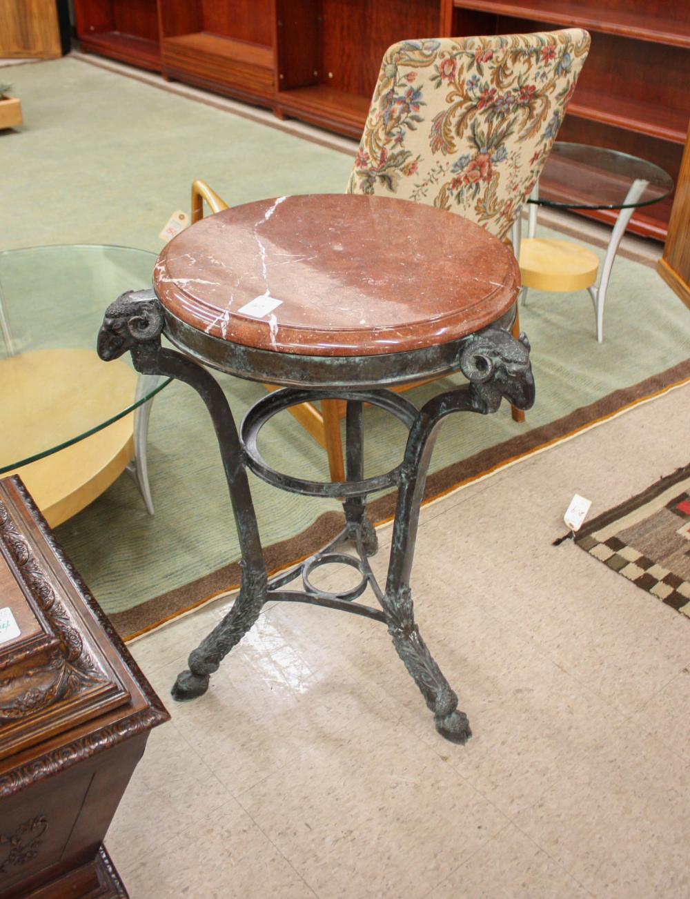 Appraisal: NEOCLASSICAL STYLE BRONZE MARBLE-TOP TABLE having a round rouge marble