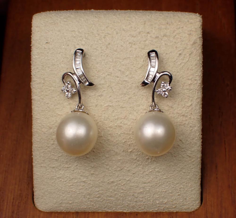 Appraisal: PAIR OF PEARL AND EIGHTEEN KARAT GOLD EARRINGS each white