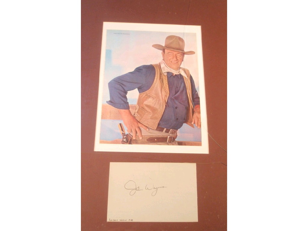 Appraisal: John Wayne Colour print from Chisholm and autograph framed