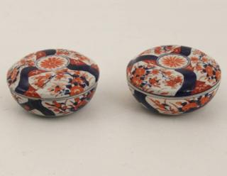 Appraisal: PAIF OF TH C MULTI-COLORED IMARI COVERED RICE BOWLS H