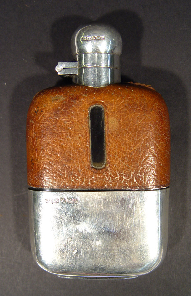 Appraisal: Silver and leather mounted glass hip flask Sheffield cm in