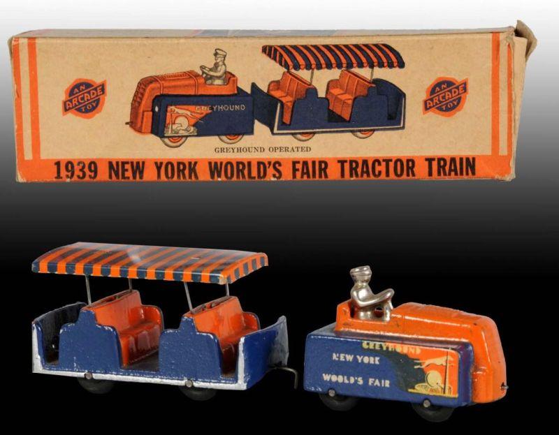 Appraisal: Cast Iron Greyhound NY World's Fair Tractor Toy OB Description